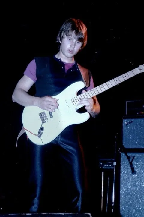 Leather pants and a white strat
